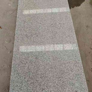 陕西芝麻白光面毛板